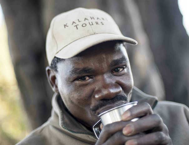 Guide drinking coffee